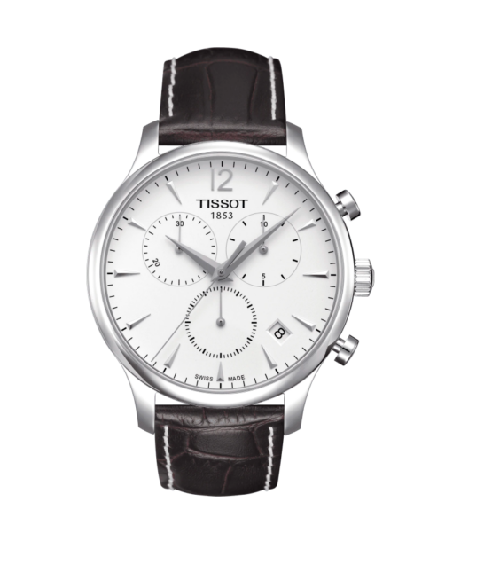 Tissot - Tradition Chronograph – Urets vandtæthed 3ATM / 30 meter. Uret har safir glas, stålurkasse, brun læderrem og hvid urskive.