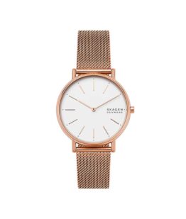 Quartz ur og vandbeskyttet til 3 ATM. Uret har mineral glas, en urkasse og mesh lænke i rustfrit stål/rosa guld PVD coating og hvid urskive. Uret måler 38mm i diameter.